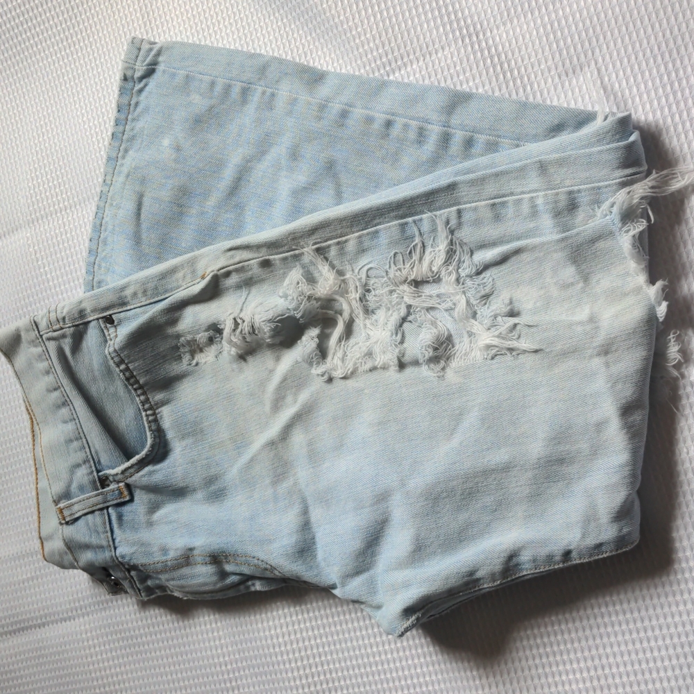 Distressed light wash jeans